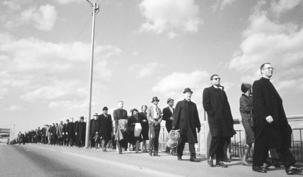 Civil rights marchers cross the Edmund Pettus Bridge on their second attempt to march from Selma to Montgomery, AL
in March 1965. Marchers were sent back by the police shortly after they crossed the bridge.