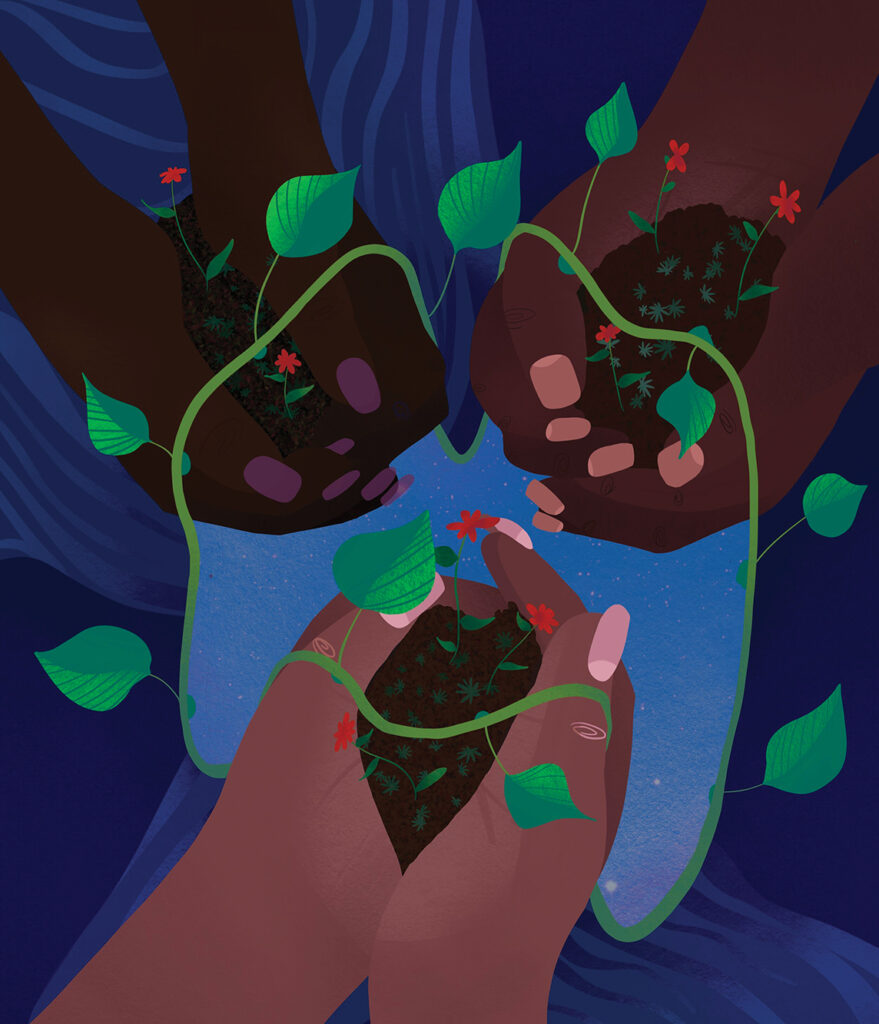 Brown hands holding vine plants